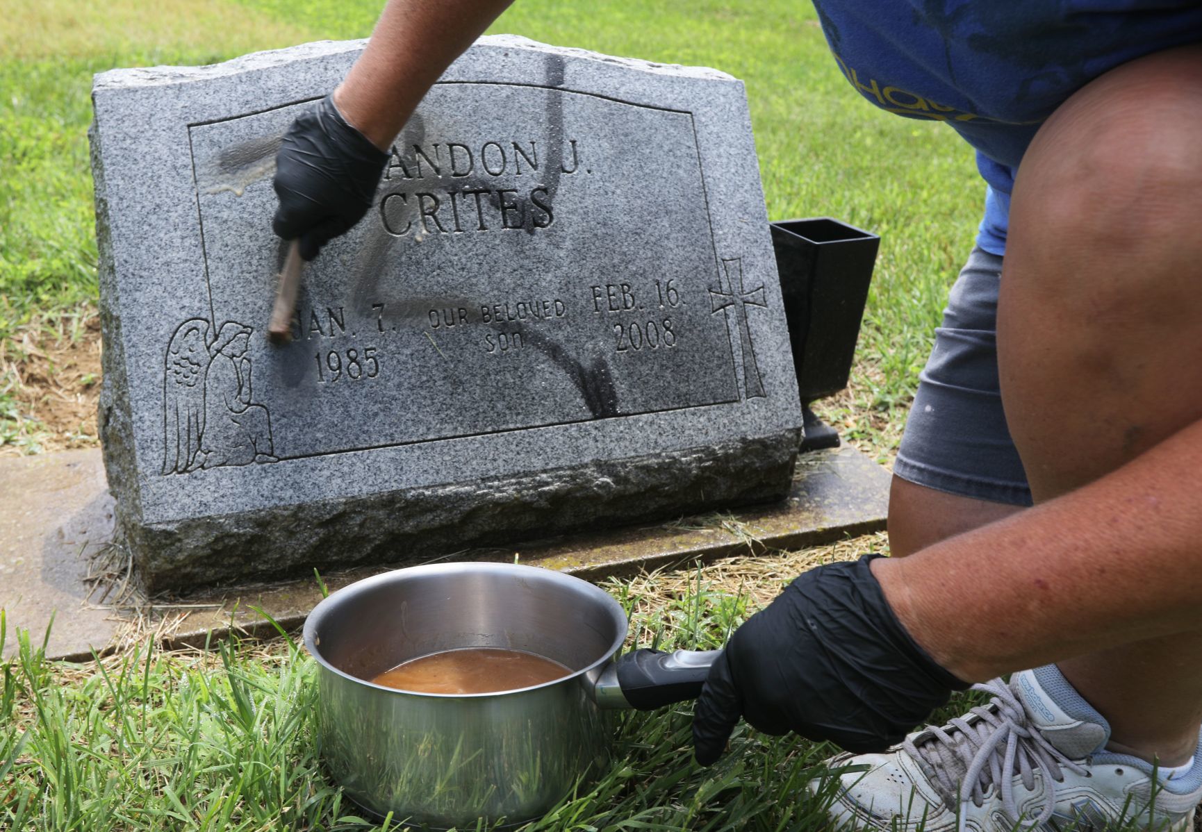Vandal spray-paints swastikas 150 to 200 headstones and markers